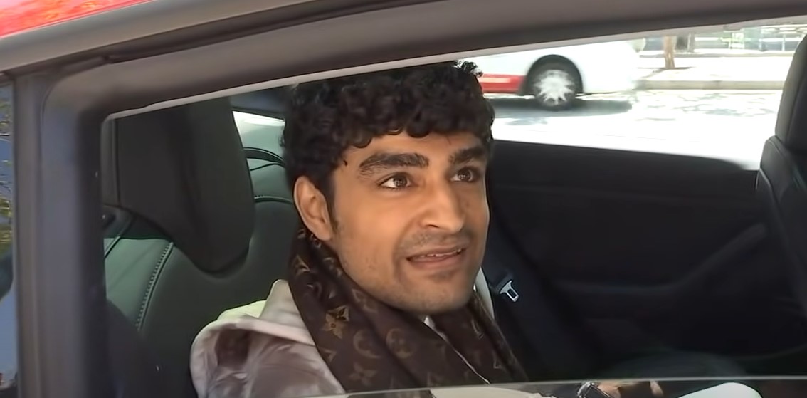 Блогера задержали за поездку на заднем сиденье Tesla. Он повторил это - изображение обложка