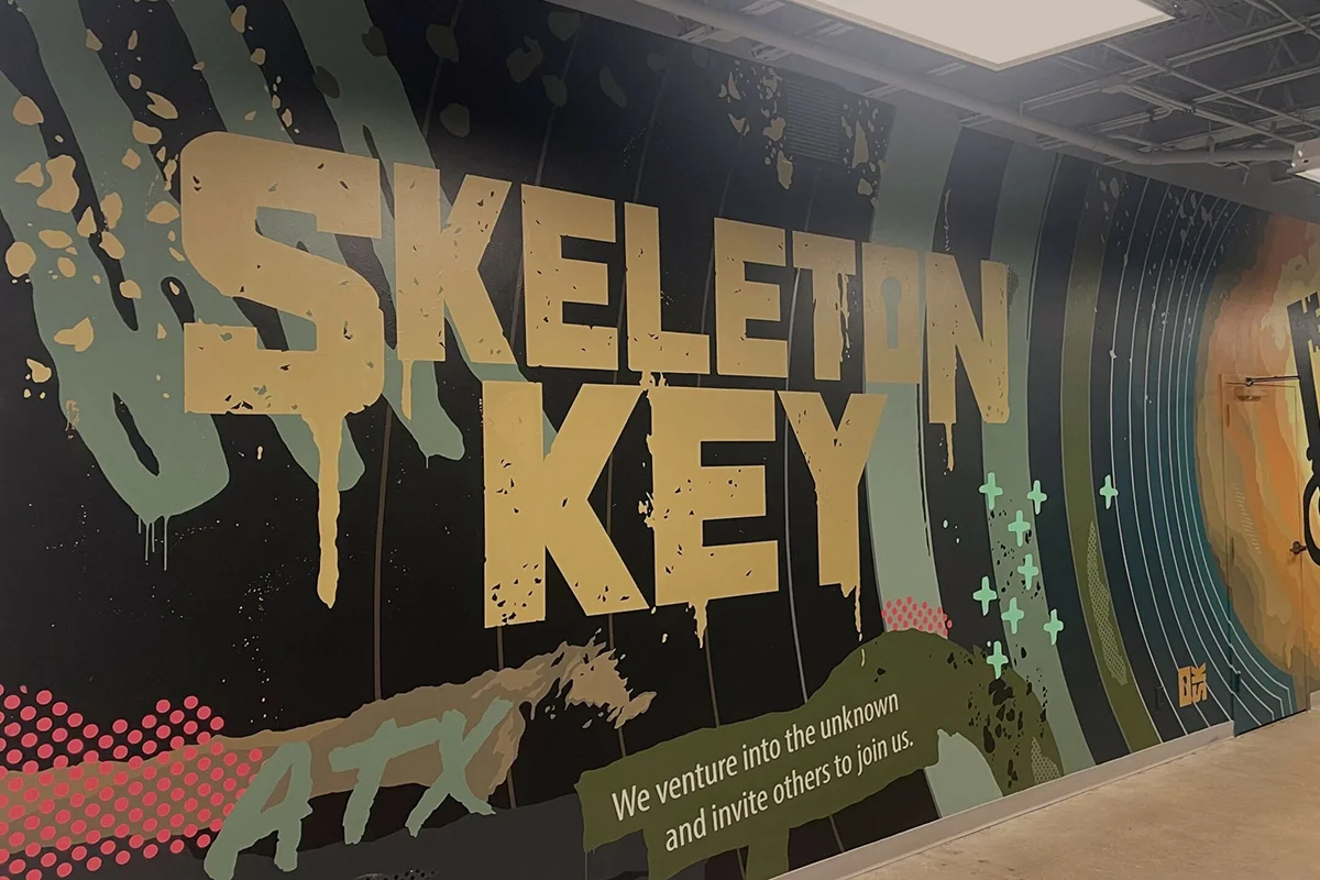 Обложка: логотип и офис студии Skeleton Key