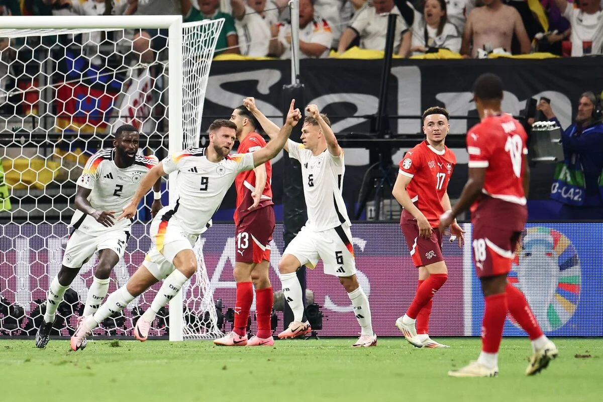 Немец Никлас Фюллькруг после гола в ворота сборной Швейцарии